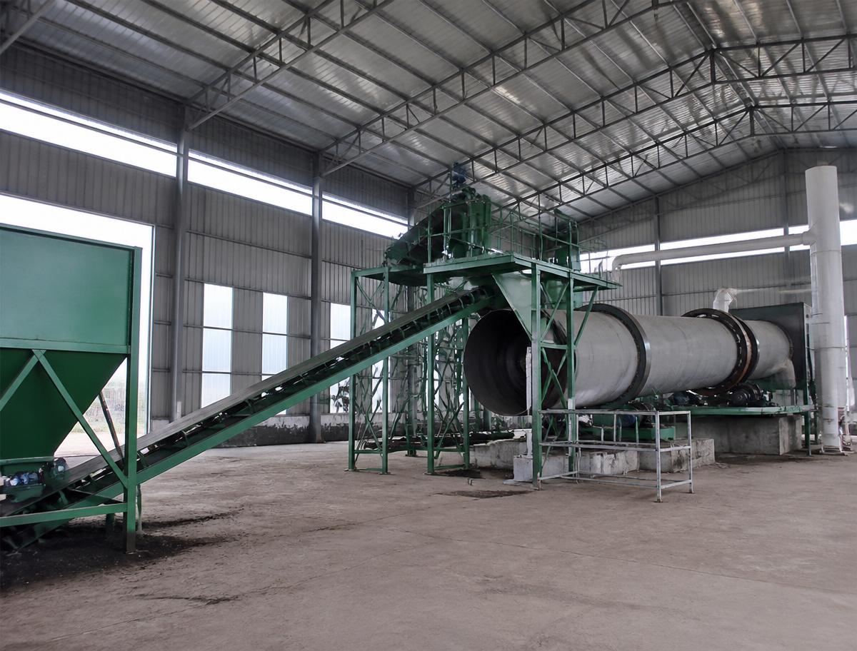 Fermented organic manure processing plant with conveyors and rotary drum